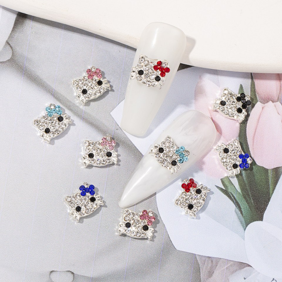 hello kitty küünte võlusid
